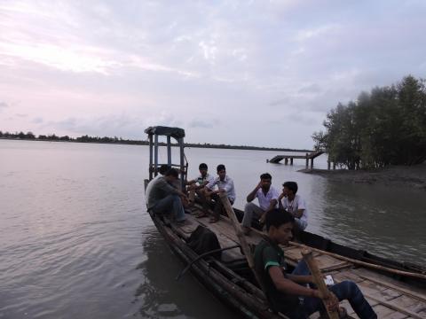 Villagers leaving Dayapur ghat in a diesel run boat
